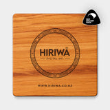 Back of handmade reclaimed rimu coaster featuring the engraved Hiriwā Digital Art logo and website
