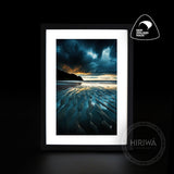Tidal Patterns coastal artwork showing low-tide patterns beneath dark clouds by Hiriwā Digital Art.